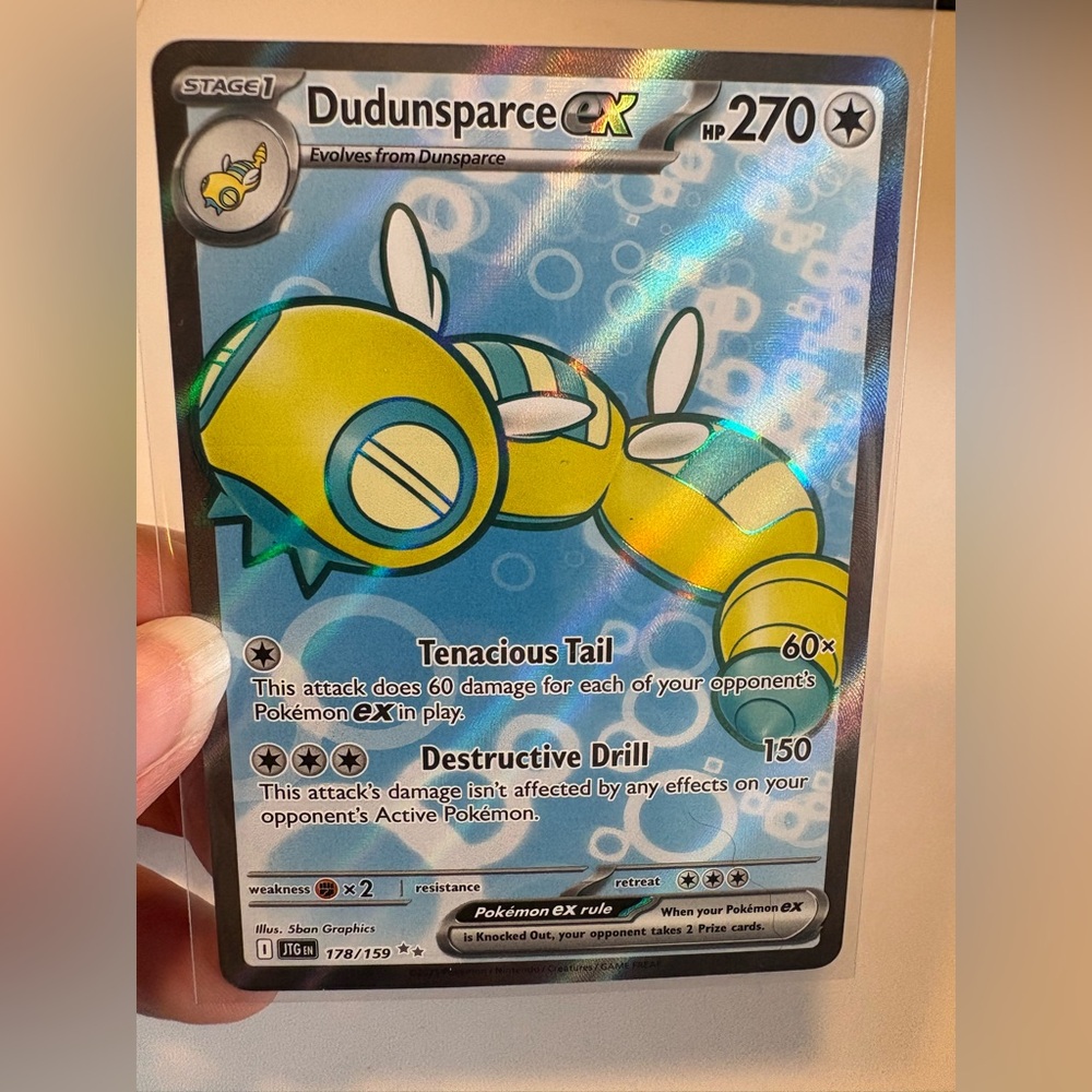 Dudunsparce EX Holographic Pokémon Card - Yellow & Teal